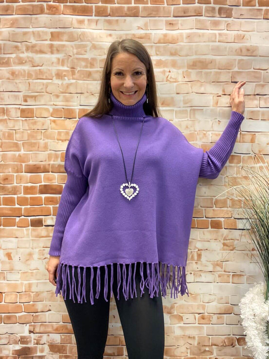 Rollkragenpullover mit Fransen