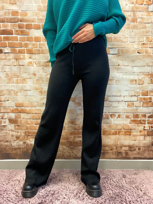 Moderne lange ausgestellte Strick-Stoffhose