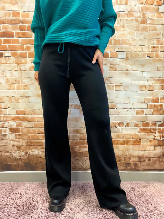 Moderne lange ausgestellte Strick-Stoffhose