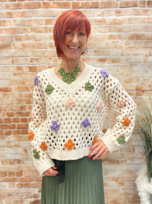 Netzpullover mit Blumen und V-Ausschnitt