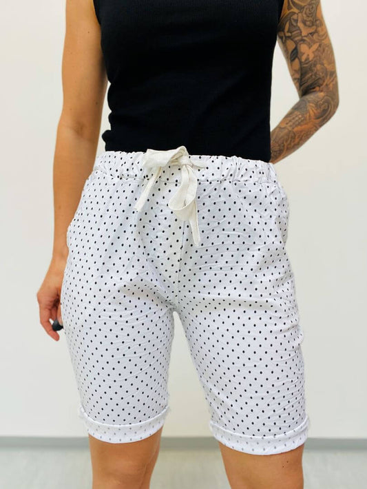 Knielange gepunktete Schlupfhose