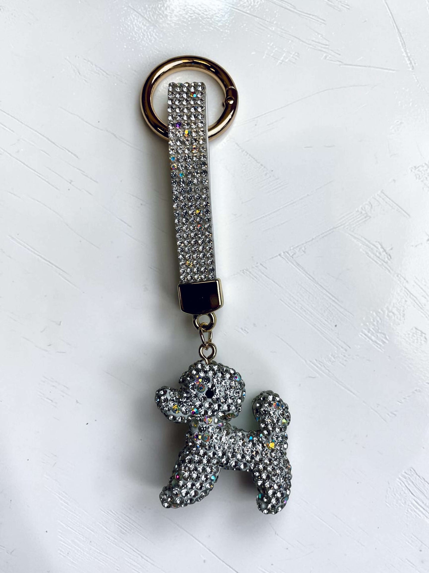 Kleiner Strass-Taschenahänger "Pudel"